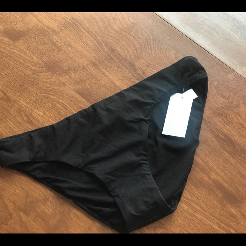 Two pair of bikini bottoms.